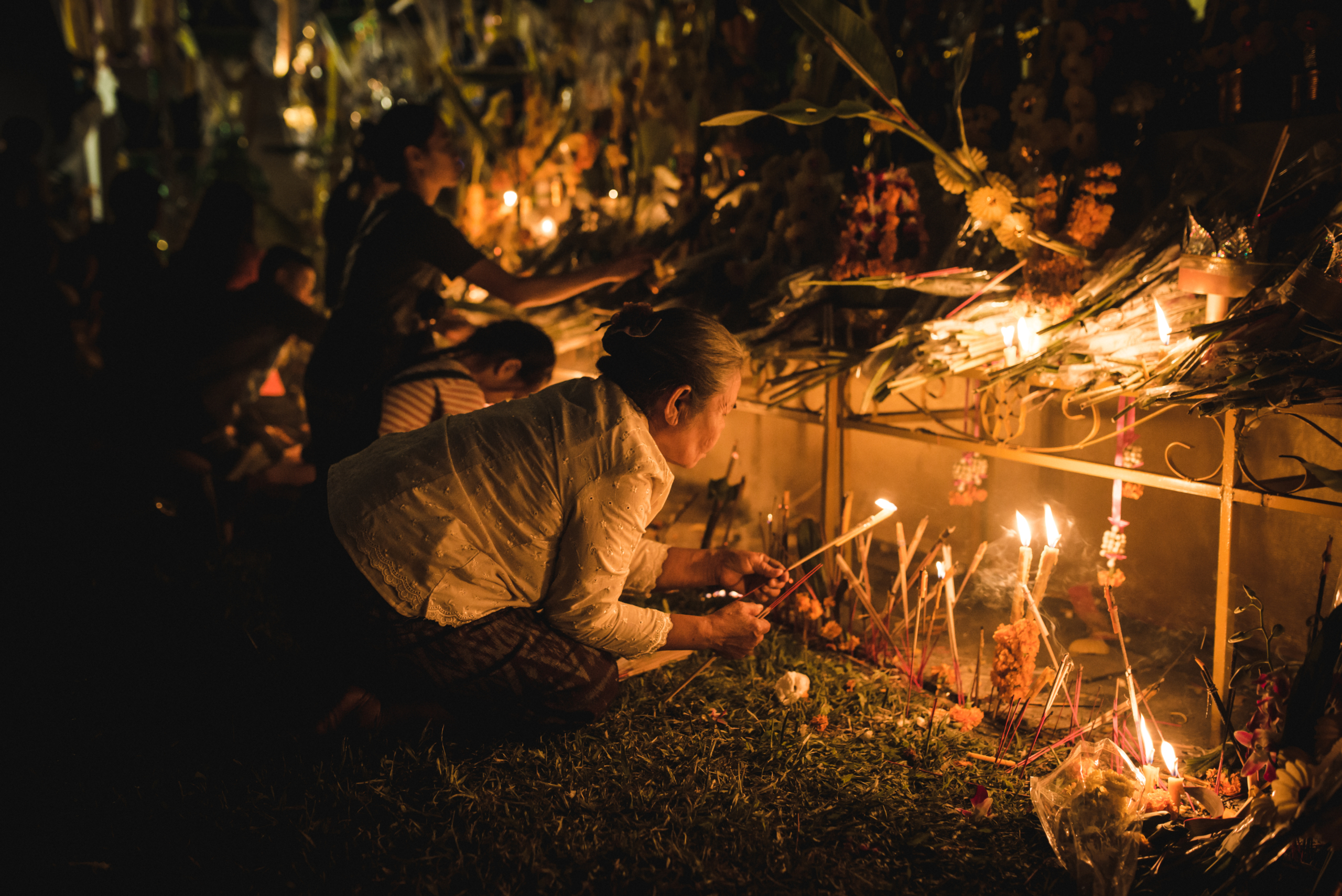 Devotees holding candles at the Boun That Luang festival in Vientiane